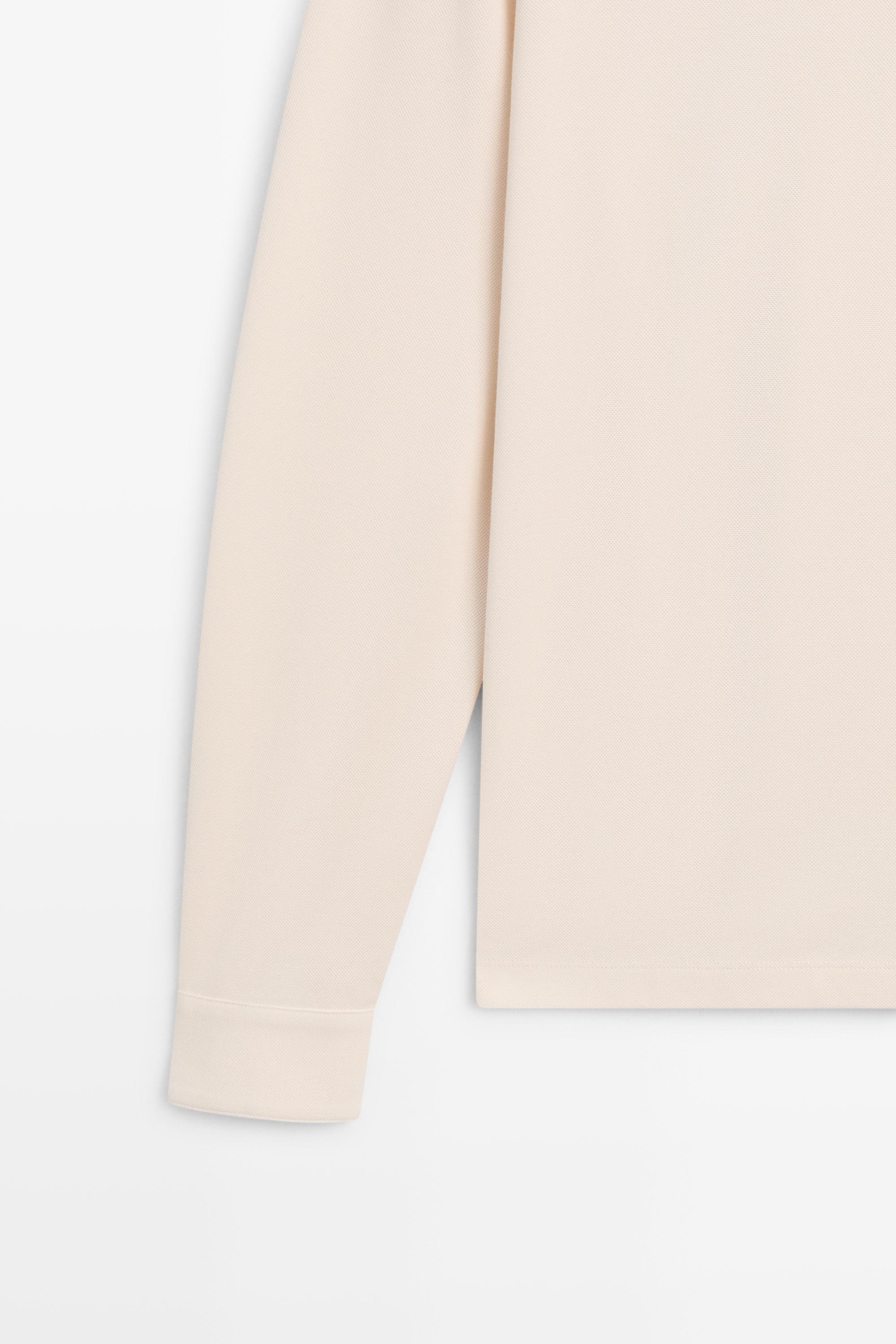 100% cotton micro-textured knit polo shirt